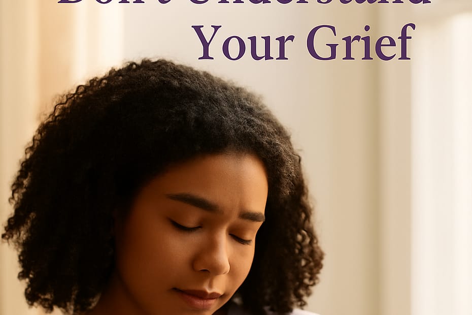 A woman sitting in soft natural light, representing the quiet loneliness of feeling misunderstood in grief.